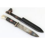 A WWII Hitler Youth knife, the 14cm steel blade stamped with the maker's mark K&Co Solingen and