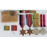 Four WWII medals, comprising 1939-45 and Defence Medals and Burma and 1939-45 Stars, in issue box