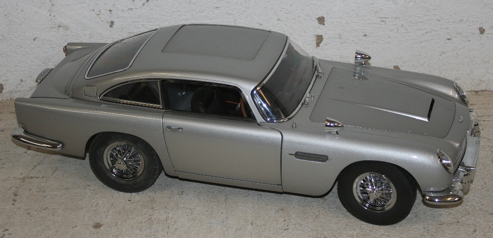 A 1/8 scale die cast home assembled James Bond Aston Martin DB5, 56 cm, constructed from 85 issues