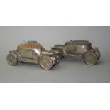 A novelty pewter pin cushion, in the form of a veteran car, length 13cm and a matching example in
