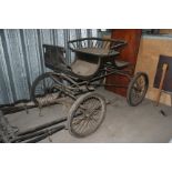 A black cut under Phaeton carriage, believed by Sunningdale, Berkshire, with a set of shafts for a