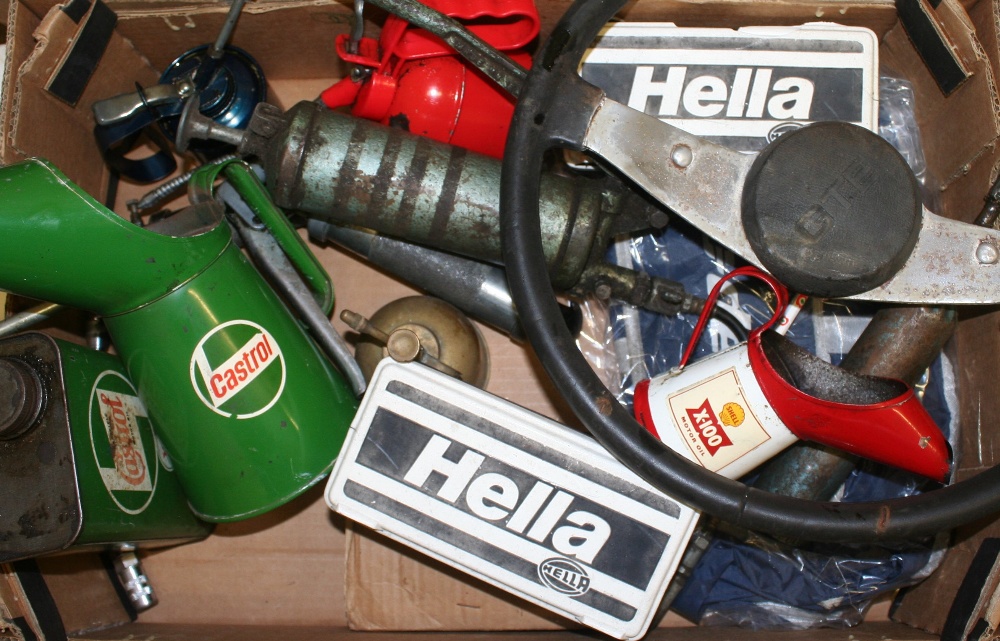 A quantity of automobilia, to include a green Castrol Oil jug, a red Shell Oil jug and a pair of