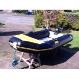 A Zodiac series one S134 RIB with a 15HP Mercury outboard motor, 3.4 metre in length with