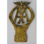 A type 1911 AA brass car badge, circa 1912/13, numbered 61592, height 16.5 cm.