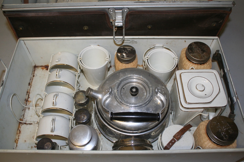 A 1930's Garrison picnic hamper for four place settings, the metal trunk opening to reveal a near - Bild 2 aus 4