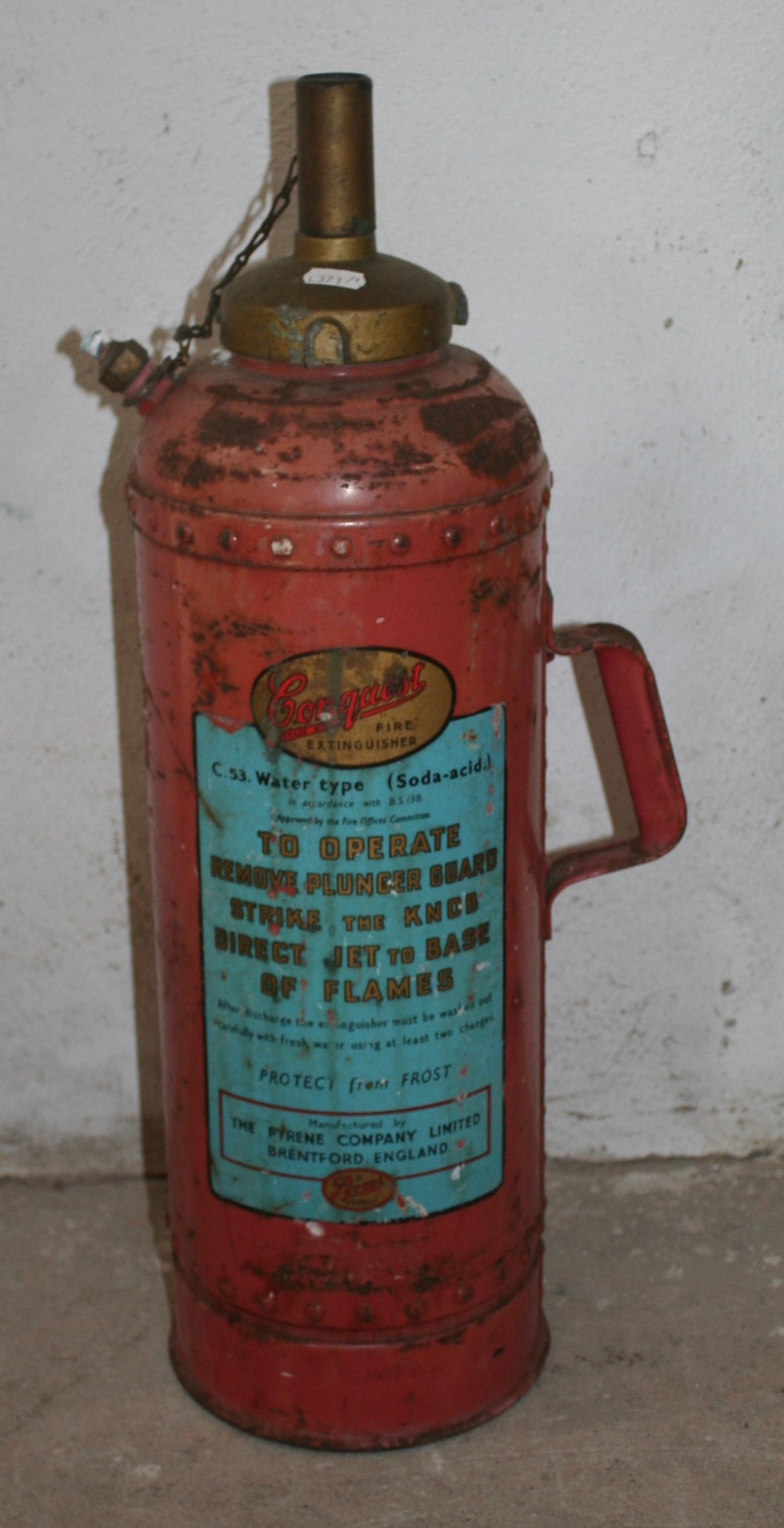 A vintage Conquest C53 water (soda-acid) fire extinguisher