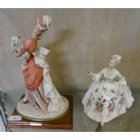 A Royal Doulton figurine 'Diana' HN 2488, together with another figurine of lady holding dog (2)