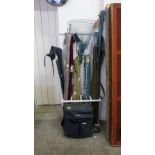Collection of fishing equipment including landing net, fishing rods, reels, floats, combination
