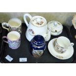 A commemorative teapot, mug, cup and saucer and a Goss marmalade jar and lustre mug