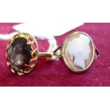 A Victorian gold mounted shell cameo ring and a 9ct gold quartz set ring (2)