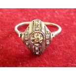 An Edwardian gold and diamond set panel ring, set with rose cut stones