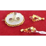 An early Victorian gold chalcedony and garnet panel brooch and a pair of gold and pearl ear pendants