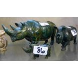 Three graduated malachite figures of rhinoceroses