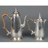 A Queen Anne style silver plated coffee pot with fruitwood handle 8", a smaller ditto 7"