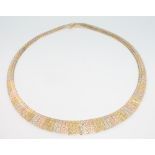 A 14ct 3 colour gold necklace 27.9 grams