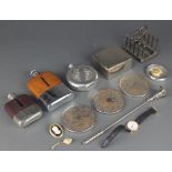 A silver plated 5 bar toast rack, a cigarette box and minor items