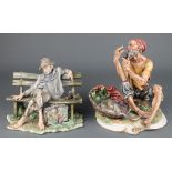 A Capodimonte figure of a fisherman smoking a pipe 10", ditto of a tramp sleeping on a bench 8" Both