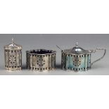 A Georgian style silver 3 piece condiment set with pierced decoration comprising mustard, salt and