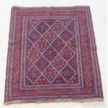 A blue and red ground tribal Gazak rug 49" x 40 1/2"