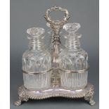 A Victorian silver plated 3 bottle decanter stand with 3 glass decanters