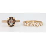 A 9ct yellow gold diamond set ring size M 1/2, a ditto quartz set ring size J