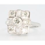 An 18ct white gold Edwardian style ring with brilliant and baguette cut diamonds approx. 1.45ct size