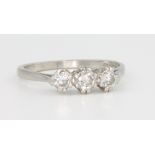 A platinum 3 stone diamond ring, size I