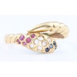 An 18ct yellow gold diamond, ruby and sapphire snake ring, size R