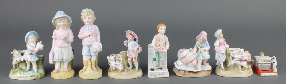 A 19th Century Continental porcelain match striker in the form of a standing boy 4 1/2" and 7