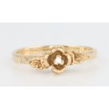 A 14ct yellow gold diamond set floral ring, size L