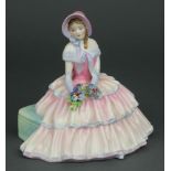 A Royal Doulton figure - Day Dreams HN1731 8 1/2 "1 petal is chipped