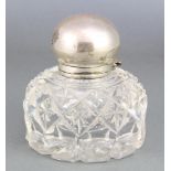 A Victorian silver mounted cut glass inkwell London 1893 5 1/4" This lot has some minor nibbles to