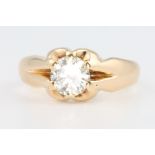 An 18ct yellow gold single stone gypsy set diamond ring approx. 1.1ct, size P