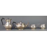 A silver 4 piece tea and coffee set of plain form with ebony mounts. Sheffield 1936/37 Gross 139