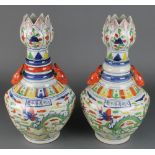 A pair of Chinese famille verte vases with tulip lips and deer handles depicting dragons 15 1/2"