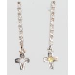 A pair of 18ct white gold diamond drop earrings