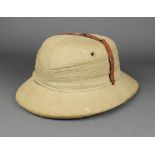 A 1930's Pith helmet size 7 1/2