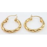 A pair of 18ct yellow gold twist earrings 4.9 grams