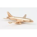 A 9ct yellow gold charm in the form of an airliner 3.3 grams