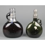 A 19th Century Continental brown glass bottle with pewter mounts 8 1/2", a green ditto 8 1/2"