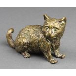 A gilt bronze figure of a seated cat 3", the tail with indistinct signature