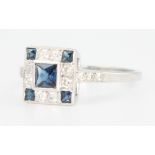 An 18ct white gold Art Deco style sapphire and diamond ring size O