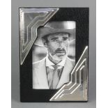 A silver Art Deco style photograph frame 7" x 5"