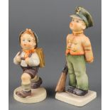 A Goebel figure of a boy soldier no. 332 5 3/4", do. boy and rucksack 822/0 4 1/2" The 2nd item