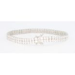 A silver cubic zirconia double line bracelet