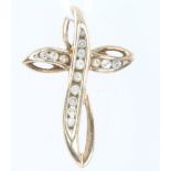 A 9ct yellow gold diamond set cross 1.8 grams