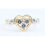 A 9ct yellow gold sapphire and diamond heart shaped ring, size N