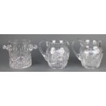 A cut glass wine cooler together with 2 ditto jugs