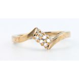 A 9ct yellow gold diamond ring, size K 1/2