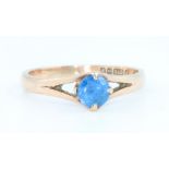 A 9ct yellow gold gem set blue stone ring size J